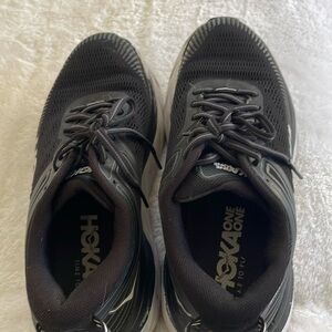 Hoka women’s sneakers black with white detail size 7 1/2. Gently used.